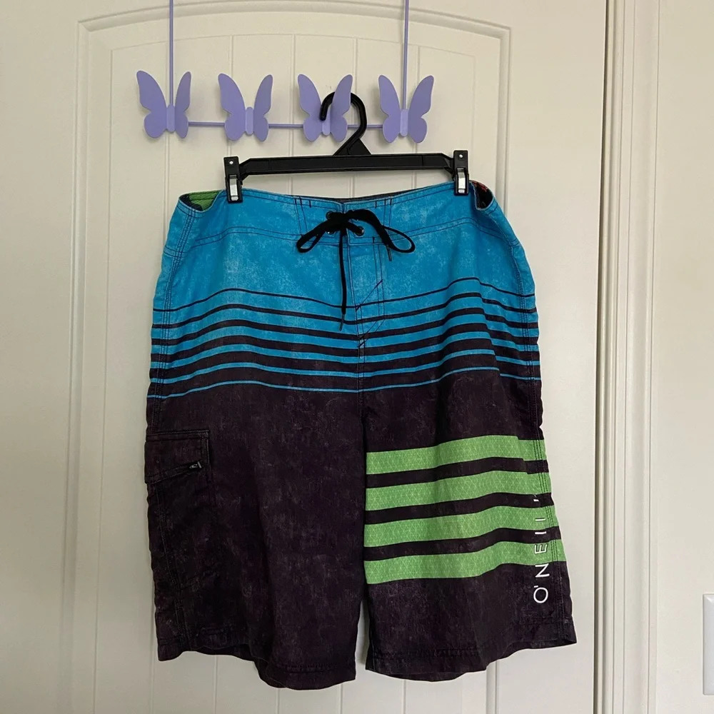 EUC | O’Neill men’s multicolored swim trunks‎ — size 34